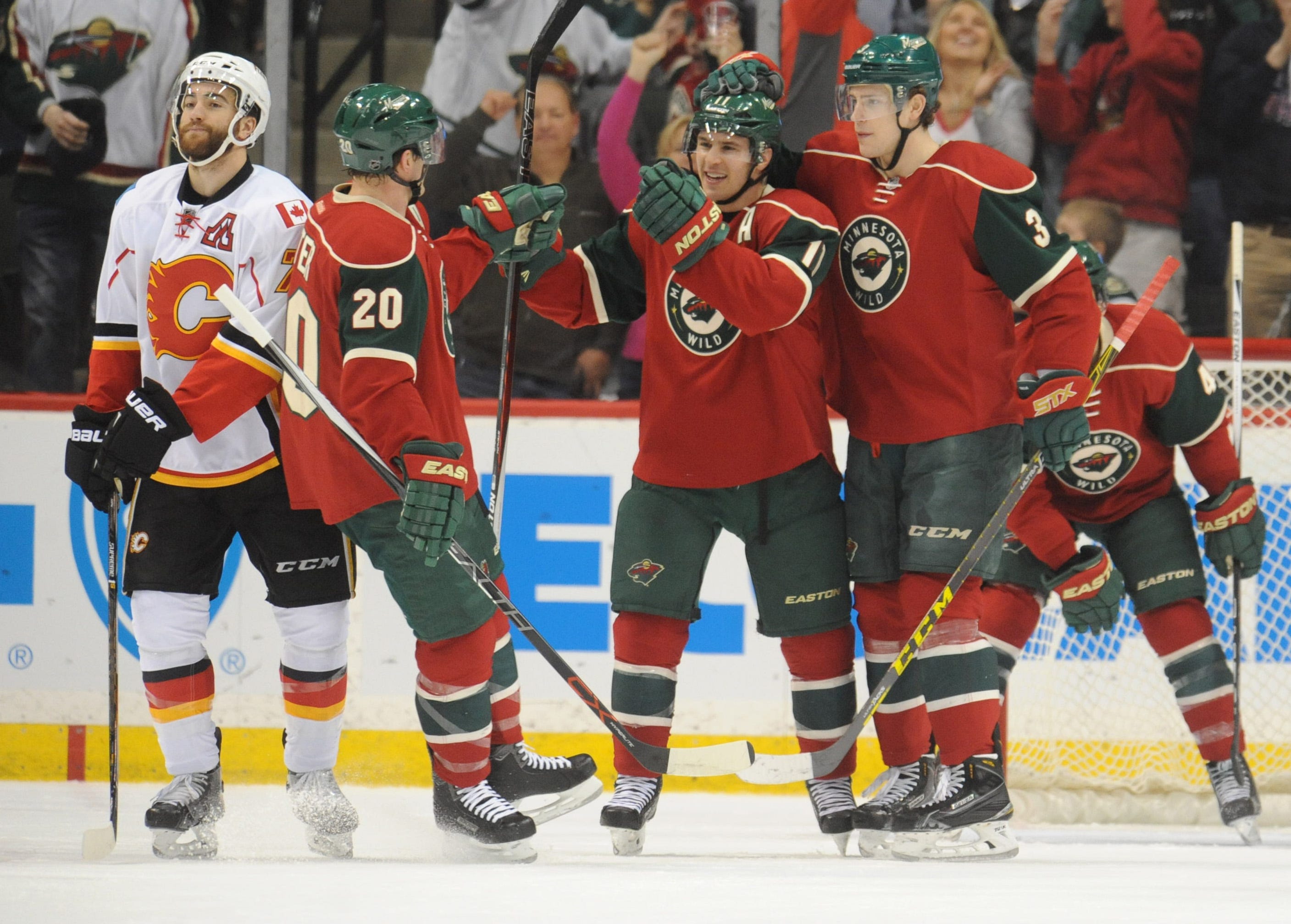hat trick leads Wild past Flames